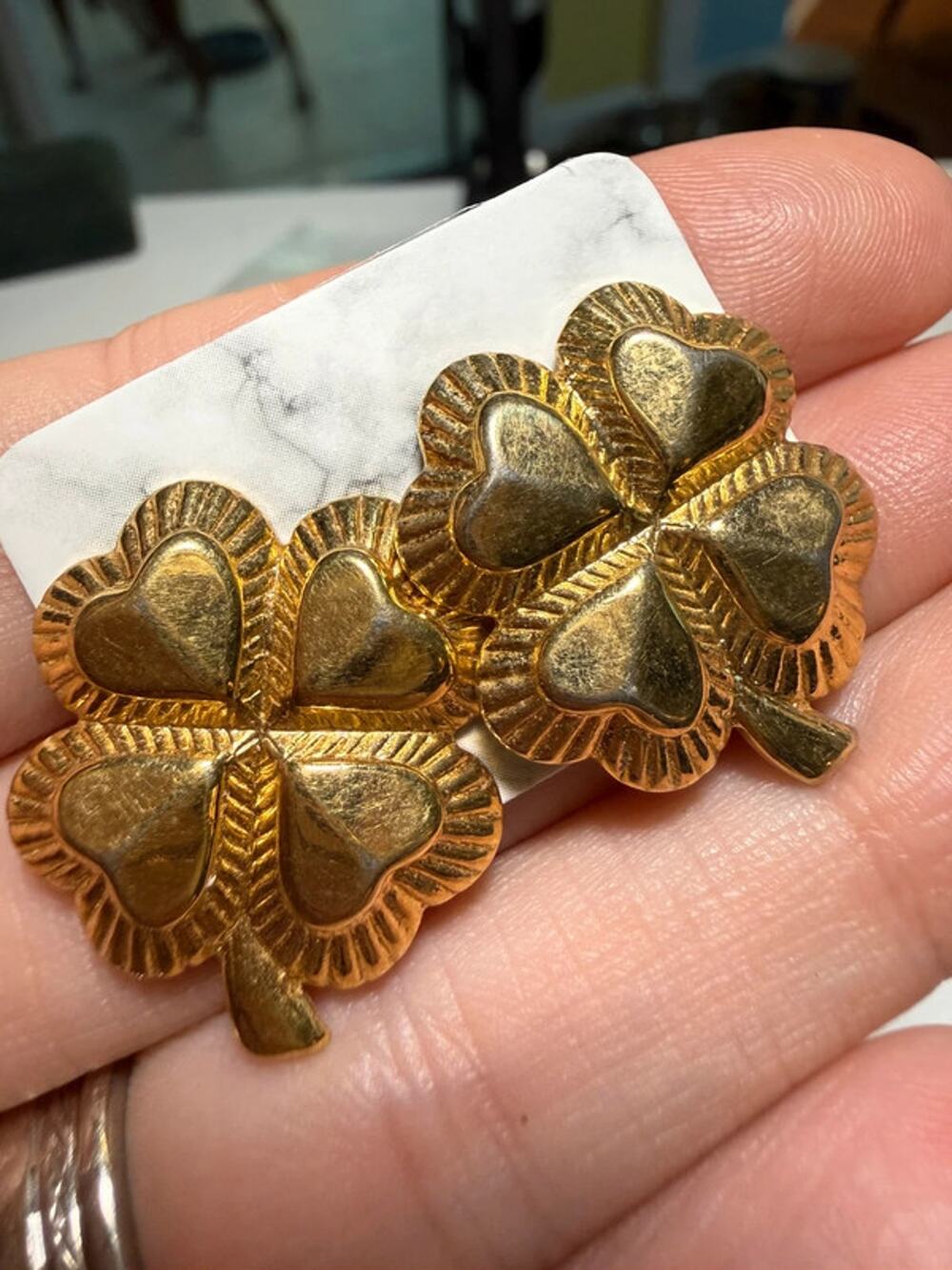 Gold tone shamrock pierced earrings 0.75”